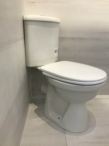 Унитаз-компакт Norm Wenkel 9854B099-7200 угловой с микролифтом Унитаз-компакт Norm Wenkel 9854B099-7200 угловой с микролифтом