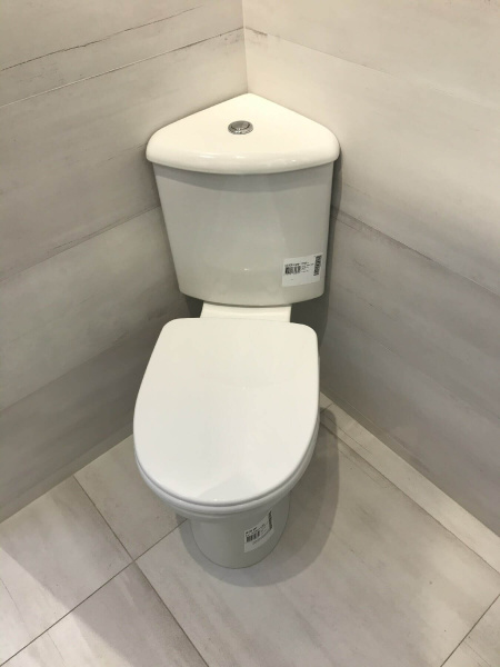 Унитаз-компакт Norm Wenkel 9854B099-7200 угловой с микролифтом Унитаз-компакт Norm Wenkel 9854B099-7200 угловой с микролифтом